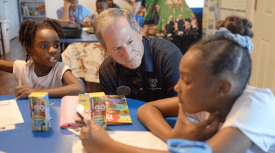 Former Air Force Chief of Staff learns about impact of Leaven Kids